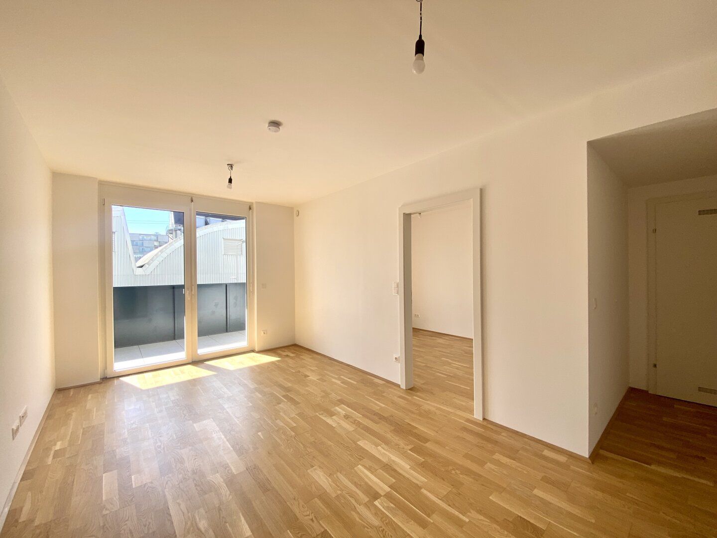 Perfekt geschnittene 2-Zimmer-Wohnung mit Balkon und Gemeinschafts-Dachterrasse
